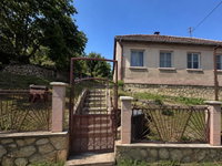 Eladó ikerház, Komlón, Gyöngyvirág utcában 32 M Ft, 2 szobás