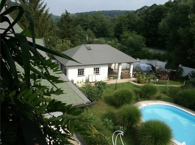 Eladó családi ház, Mánfán 109.9 M Ft, 4+2 szobás