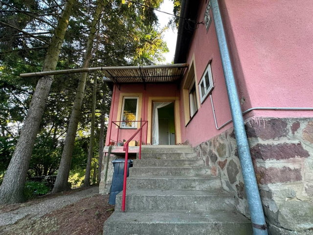 Eladó családi ház, Komlón, Rozmaring utcában 26.9 M Ft