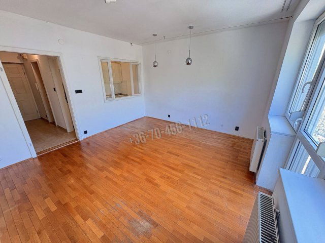Eladó téglalakás, Budapesten, XI. kerületben 58.9 M Ft, 1 szobás