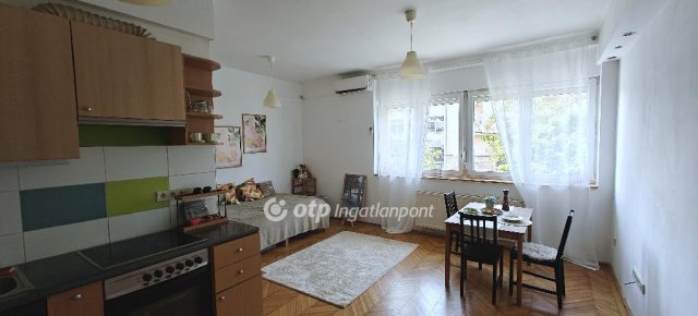 Eladó téglalakás, Budapesten, XI. kerületben 58.9 M Ft, 1 szobás