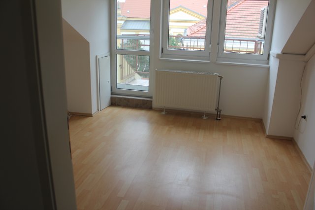 Eladó téglalakás, Kapuváron, Fő téren 49.99 M Ft, 2 szobás