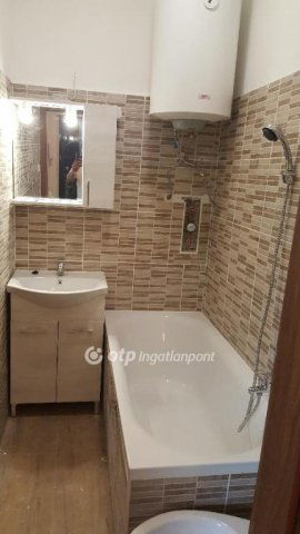 Eladó téglalakás, Budapesten, XI. kerületben 59.5 M Ft, 1 szobás