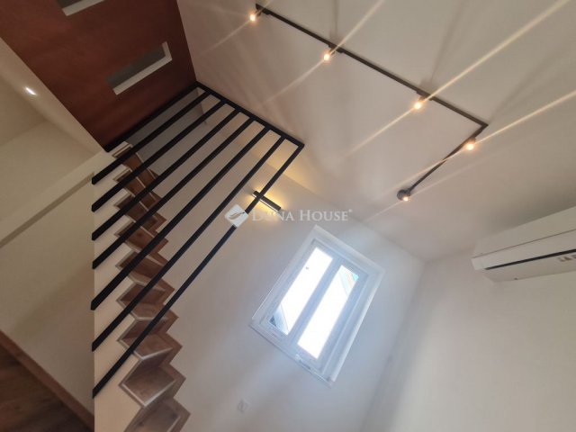 Eladó téglalakás, Budapesten, VI. kerületben 59.9 M Ft, 1 szobás