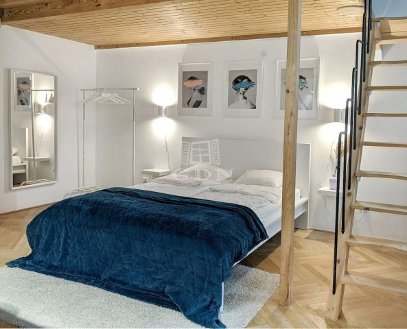 Eladó téglalakás, Budapesten, VI. kerületben 76.9 M Ft, 1 szobás