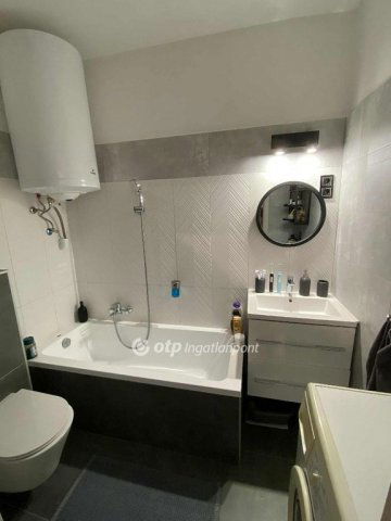 Eladó téglalakás, Budapesten, XI. kerületben 72.2 M Ft, 1 szobás