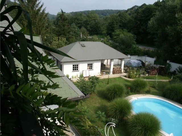 Eladó családi ház, Mánfán 109.9 M Ft, 4+2 szobás