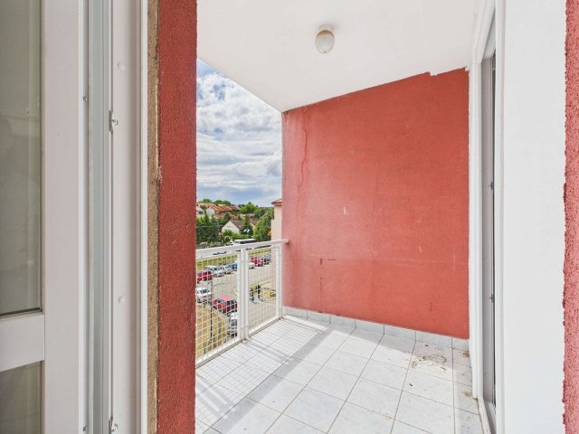 Eladó téglalakás, Balatonalmádiban 53.5 M Ft, 1 szobás