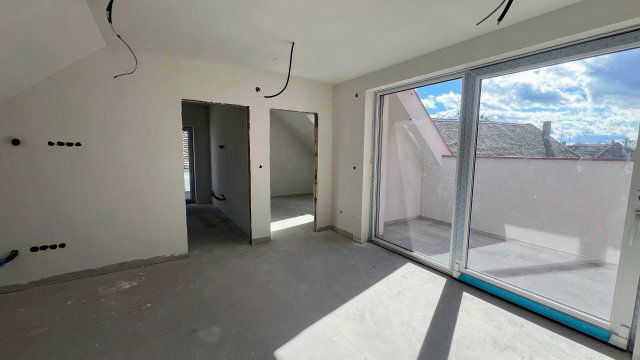 Eladó téglalakás, Baján 59.45 M Ft, 3+1 szobás