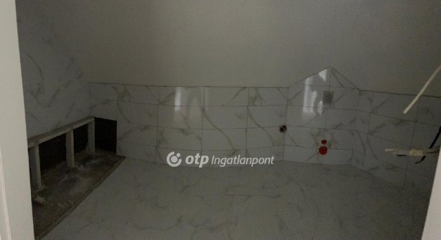 Eladó téglalakás, Fertőszentmiklóson 62.9 M Ft, 2+1 szobás