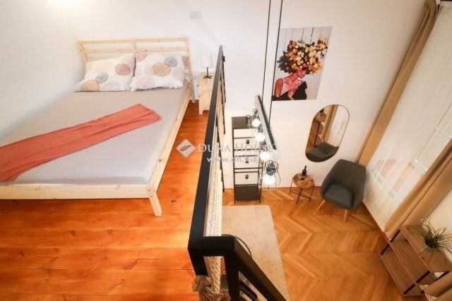 Eladó téglalakás, Budapesten, VI. kerületben 57.9 M Ft, 1 szobás