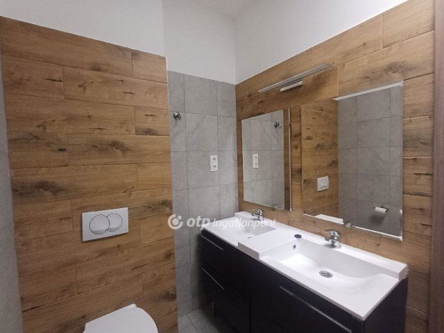 Eladó téglalakás, Szigetszentmiklóson 58.9 M Ft, 1+2 szobás