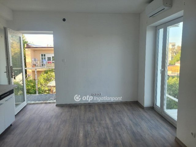 Eladó téglalakás, Budapesten, XXII. kerületben 24 M Ft, 1 szobás