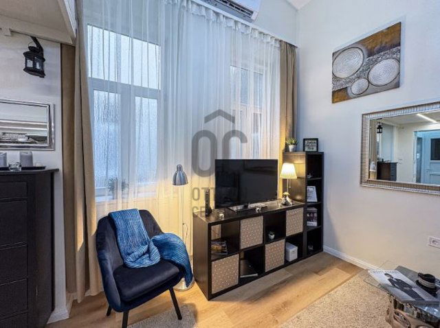 Eladó téglalakás, Budapesten, VI. kerületben 69.9 M Ft, 1 szobás