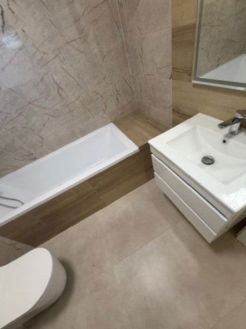 Eladó téglalakás, Komáromban 87 M Ft, 4 szobás