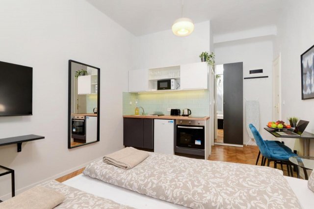 Eladó téglalakás, Budapesten, VIII. kerületben, Rákóczi úton