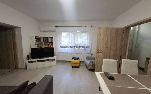 Eladó téglalakás, Budapesten, X. kerületben, Román utcában