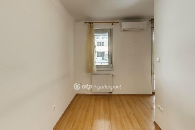 Eladó téglalakás, Budapesten, XI. kerületben 69.9 M Ft, 1 szobás