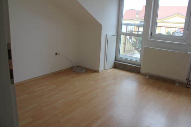 Eladó téglalakás, Kapuváron, Fő téren 49.99 M Ft, 2 szobás