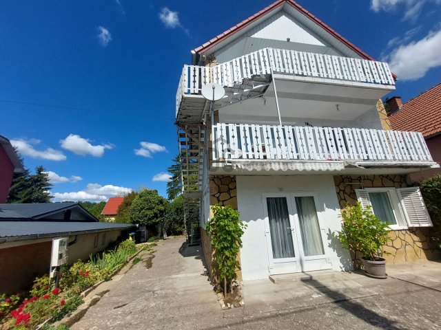 Eladó családi ház, Igalon 84.99 M Ft, 9 szobás