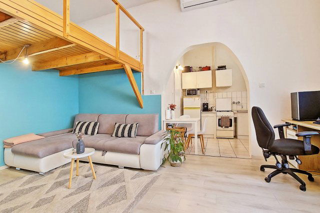 Eladó téglalakás, Budapesten, VI. kerületben 49.9 M Ft, 1 szobás