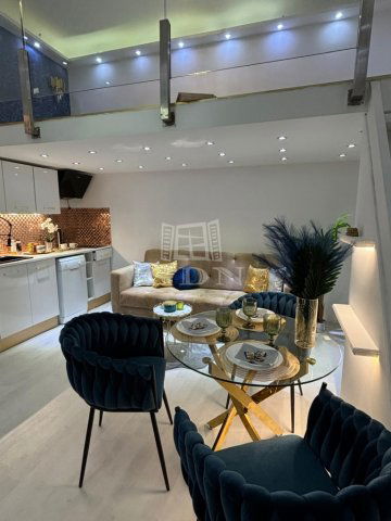 Eladó téglalakás, Budapesten, VI. kerületben 59.8 M Ft, 1 szobás