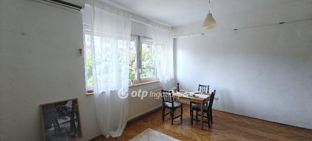 Eladó téglalakás, Budapesten, XI. kerületben 58.9 M Ft, 1 szobás