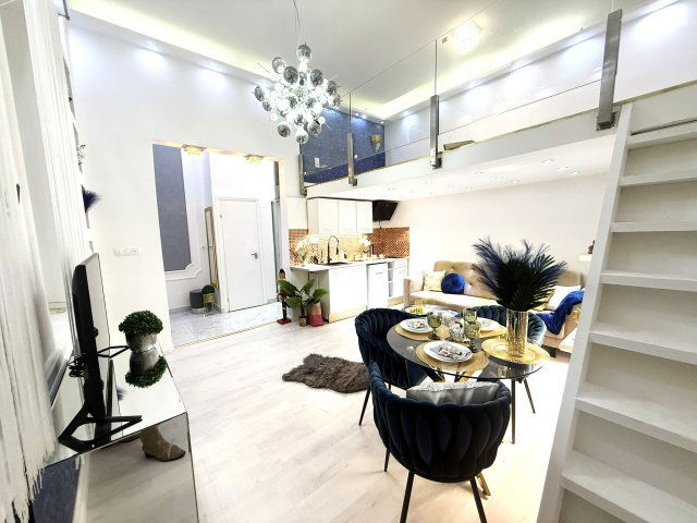 Eladó téglalakás, Budapesten, VI. kerületben 59.8 M Ft, 1 szobás