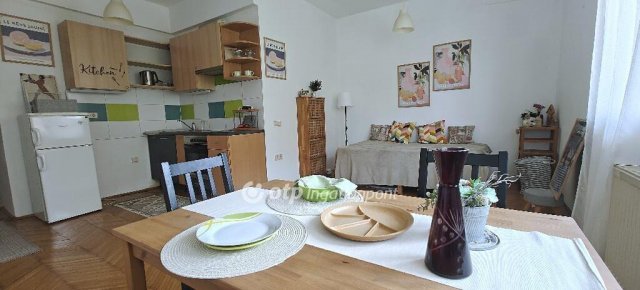 Eladó téglalakás, Budapesten, XI. kerületben 58.9 M Ft, 1 szobás