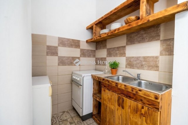 Eladó téglalakás, Budapesten, I. kerületben 62.95 M Ft, 1 szobás
