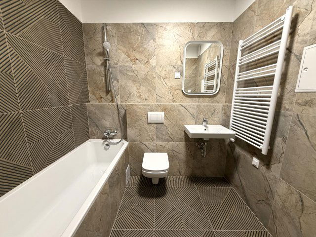 Eladó téglalakás, Budapesten, VIII. kerületben, Corvin sétányon