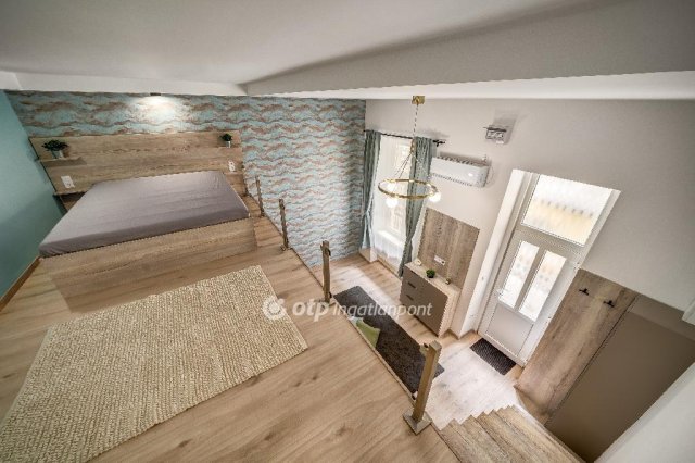 Eladó téglalakás, Budapesten, VI. kerületben 51.9 M Ft, 1 szobás