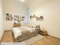 Eladó téglalakás, VI. kerületben 64.9 M Ft, 1 szobás