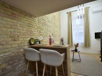 Eladó téglalakás, VI. kerületben 53.5 M Ft, 1 szobás