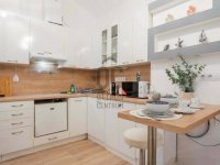 Eladó téglalakás, VI. kerületben 46.9 M Ft, 1 szobás