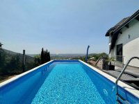 Eladó családi ház, Pécsett 425 M Ft, 6 szobás